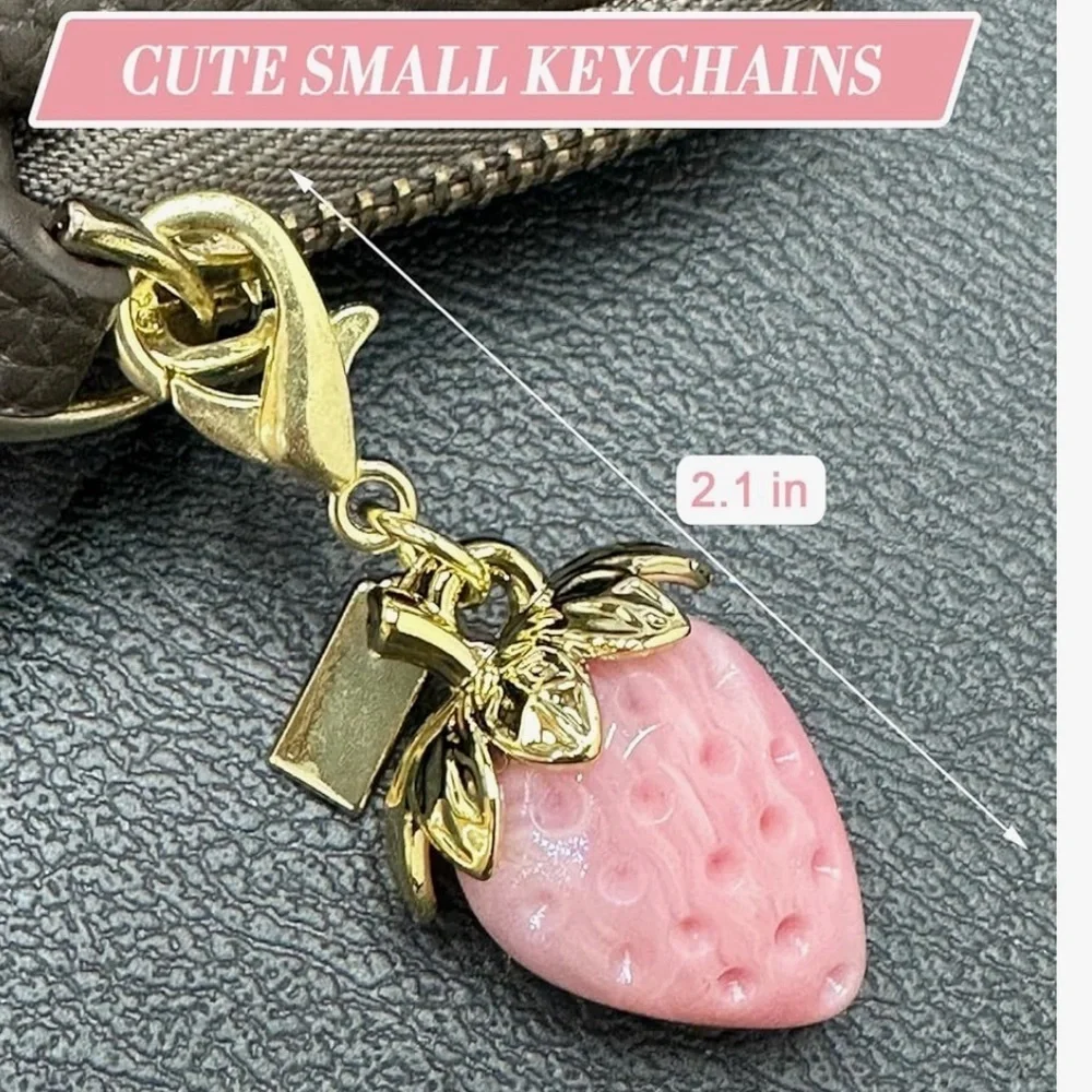 Pink strawberry purse charm with gold hardware